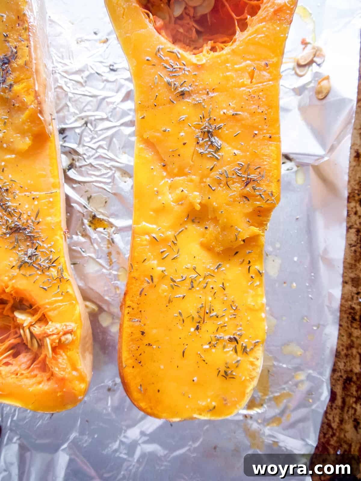Golden Butternut Chicken Comfort 5 Butternut squash roasted on a pan.