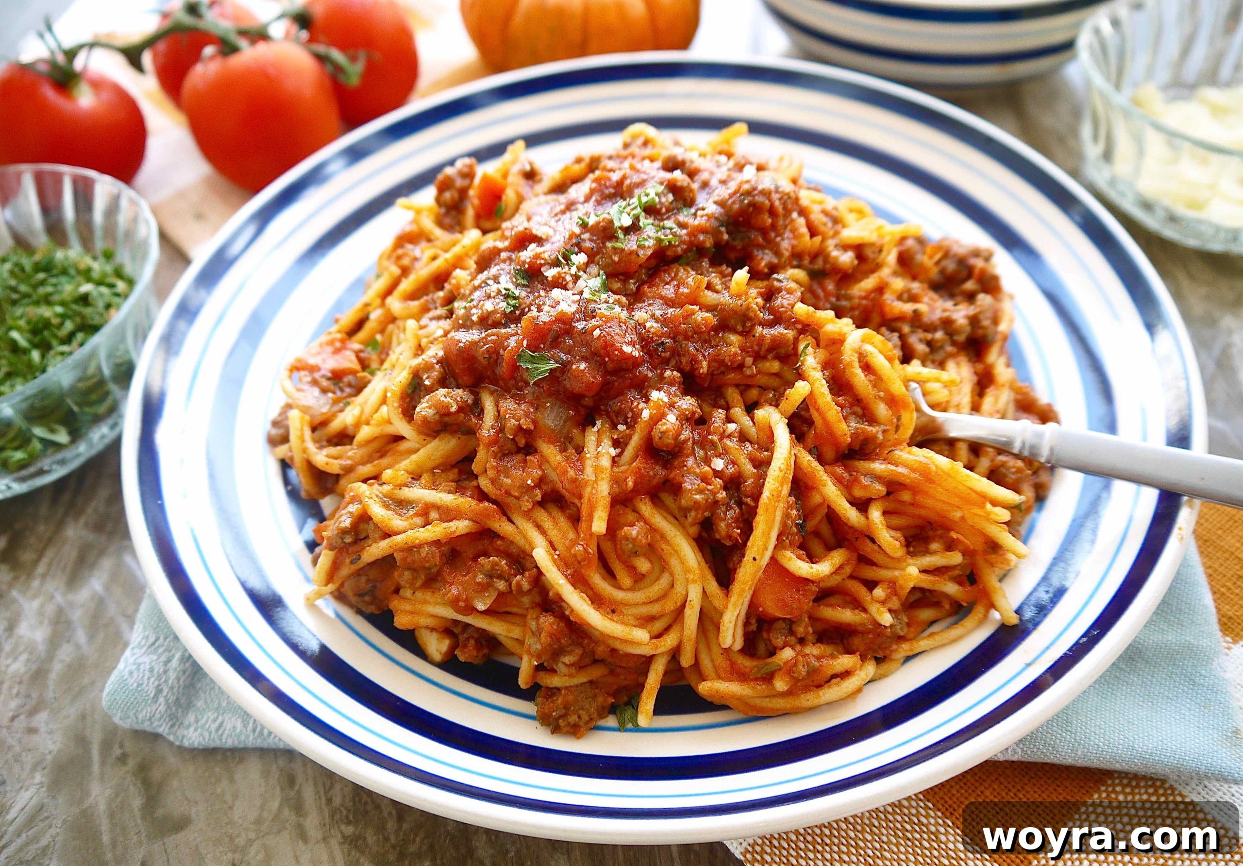 Autumn Pumpkin Ragu 3 Hearty pumpkin meat sauce simmering in a large pot, showcasing its rich texture and color, ready to be served.