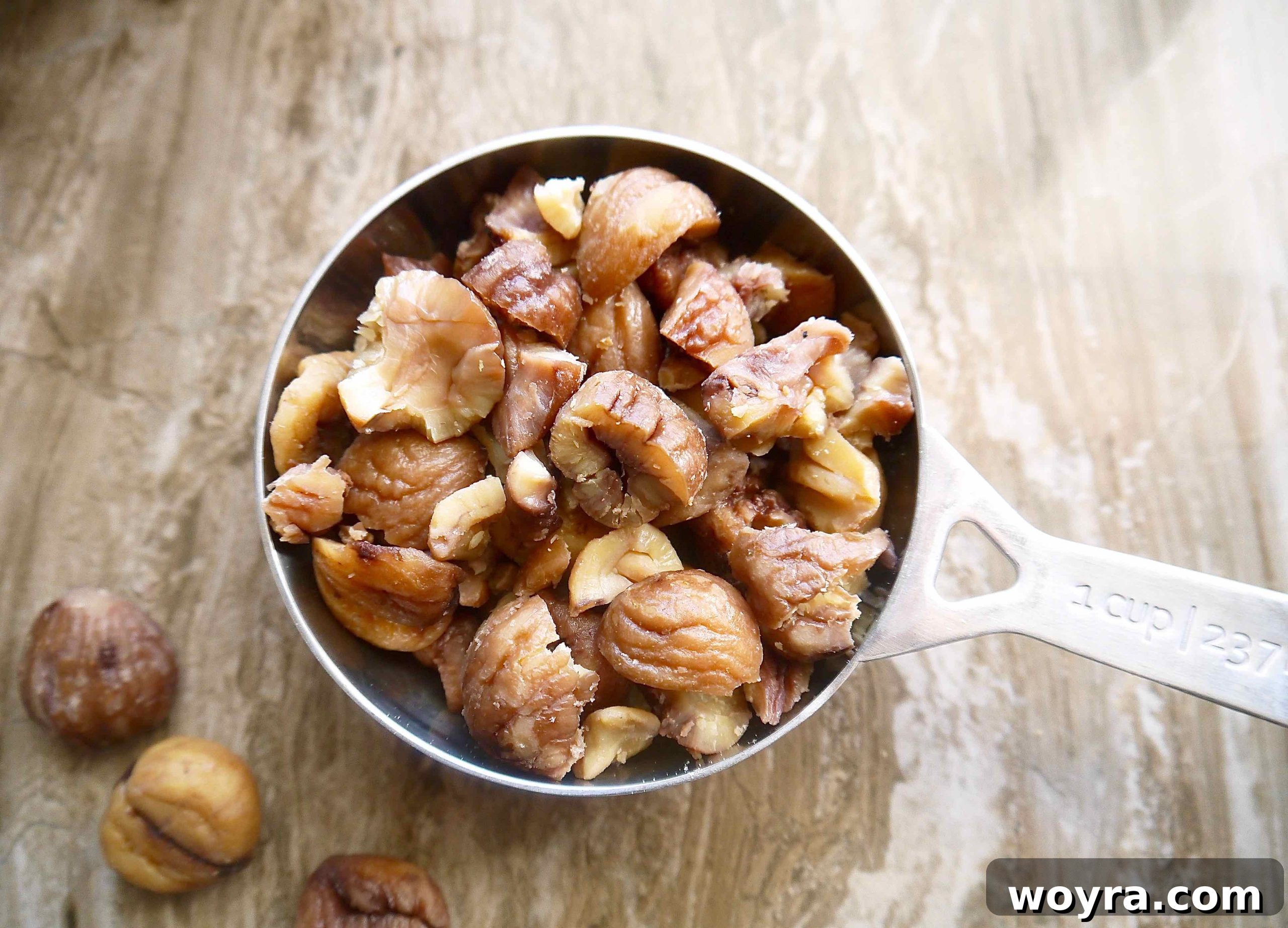 Chopped steamed chestnuts in a small bowl, ready to be incorporated into the stuffing mixture.