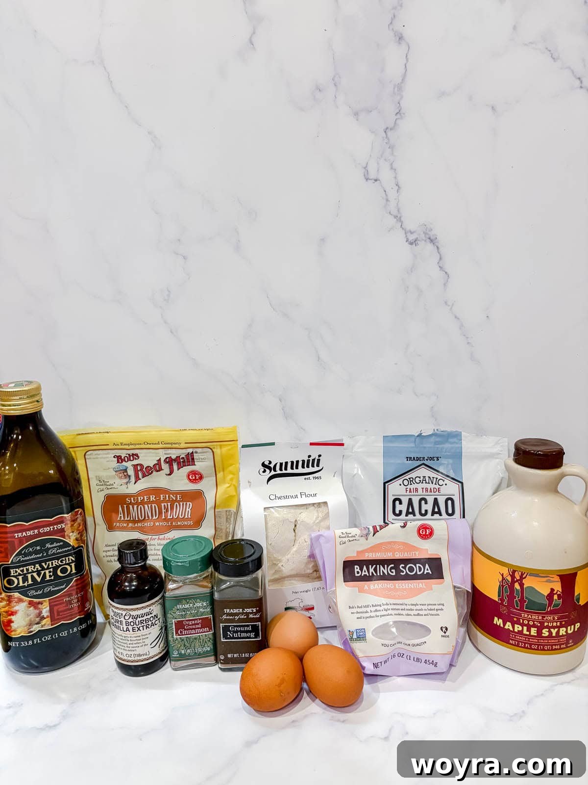 Rustic Chestnut Flour Coffee Cake 3 A flat lay image showing all the dry and wet ingredients neatly arranged on a counter, ready for making chestnut flour coffee cake.
