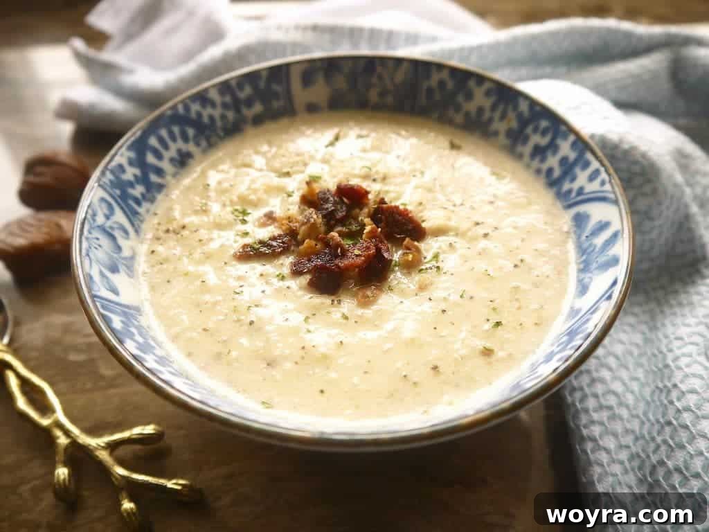 Primal Bacon Chestnut Cauliflower Soup 3 Close-up of the smooth, creamy texture of Paleo Cauliflower, Bacon, and Chestnut Soup in a bowl, highlighting its rich consistency.