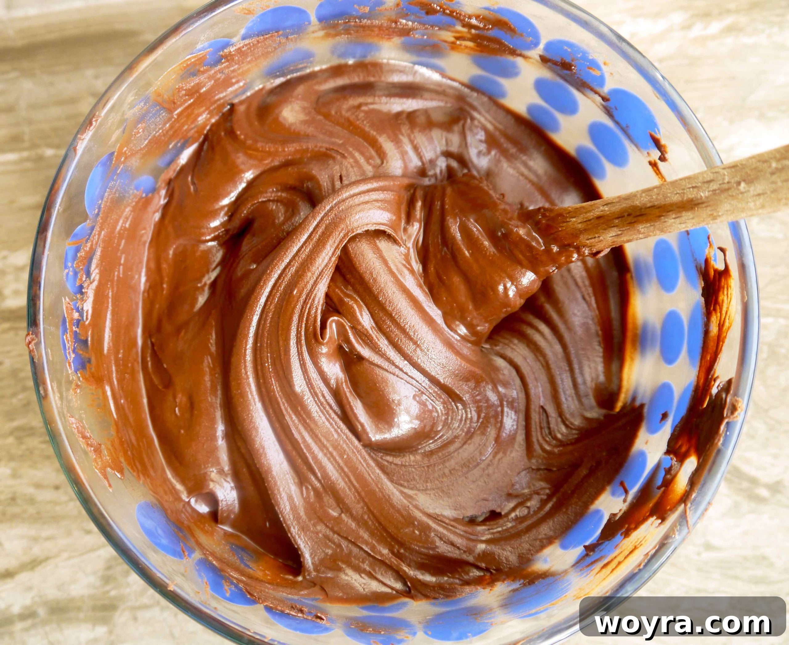 Decadent Paleo Chocolate Mousse Truffles 8 Rich, glossy dairy-free chocolate, perfectly melted and smooth, resting in a bowl.