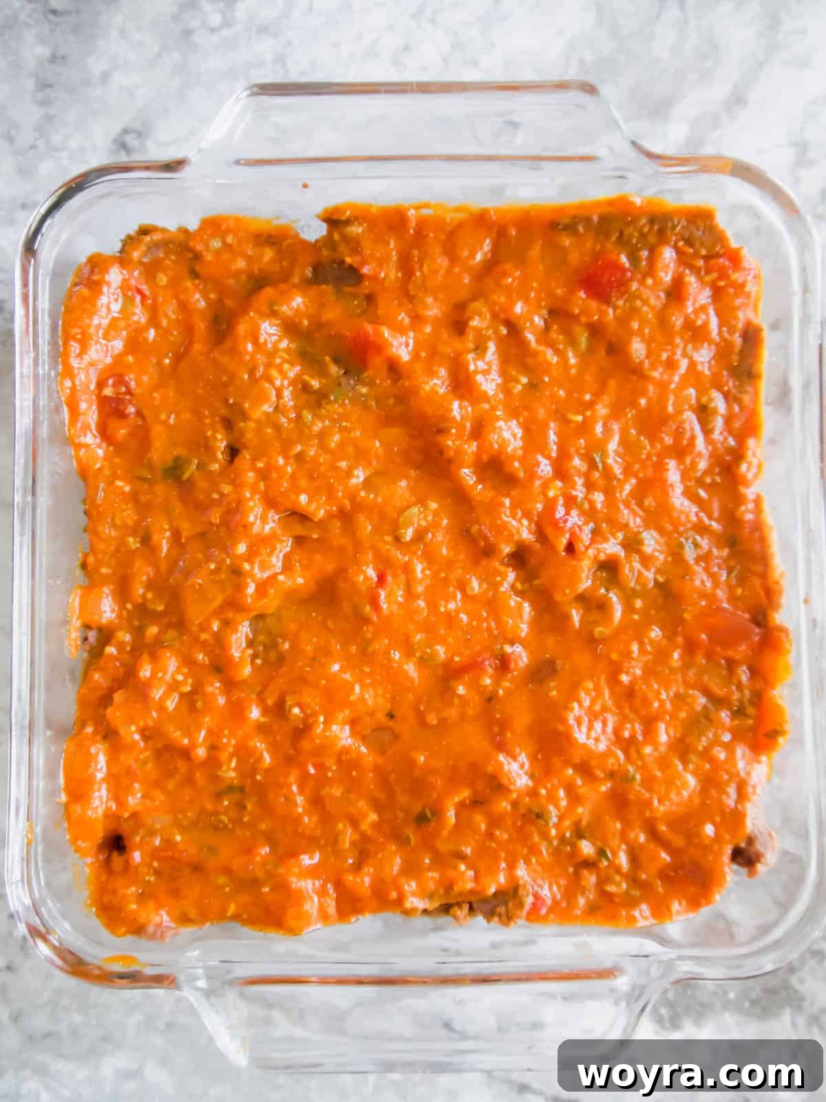 Ultimate Dairy-Free 7 Layer Turkey Taco Dip 9 Salsa layer added on top of the refried beans.